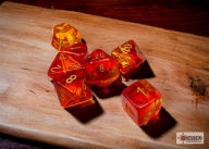Title: Gemini Polyhedral Translucent Red-Yellow/gold 7-Die Set