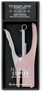 Title: Dusty Pink Standard Issue Hand Held Stapler