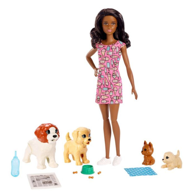 barbie doll and dog