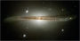 Hubble Photographs Warped Galaxy as Camera Passes Milestone