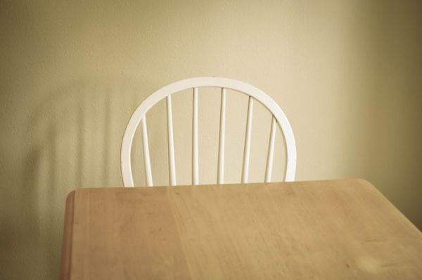 Empty Chairs At Empty Tables