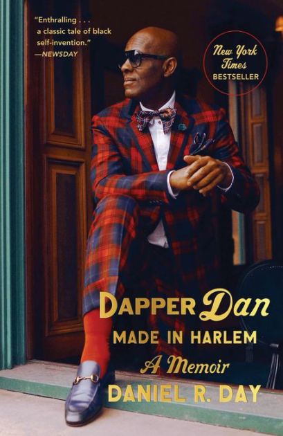 Photograph of Dapper Dan at his boutique in Harlem  National Museum of  African American History and Culture