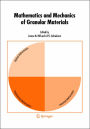 Mathematics and Mechanics of Granular Materials