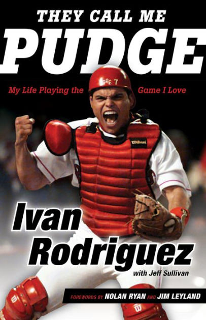 Florida Marlins catcher Ivan Pudge Rodriguez points to the sky