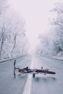 Bicycle Laid Down on a Road in Winter Journal: Take Notes, Write Down Memories in this 150 Page Lined Journal