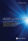 LIGHT AND VACUUM: The Wave???Particle Nature of the Light and the Quantum Vacuum through the Coupling of Electromagnetic Theory and Quantum Electrodynamics