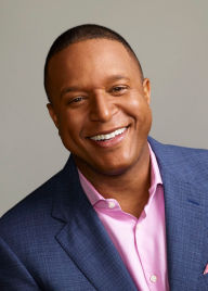 Craig Melvin signs I'M PROUD OF YOU