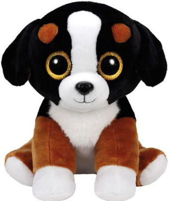 black and white plush dog