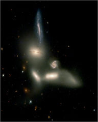 Title: Hubble Watches Galaxies Engage in Dance of Destruction, Author: JH P