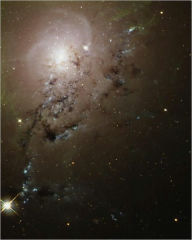 Title: Freewheeling Galaxies Collide in a Blaze of Star Birth, Author: JH P