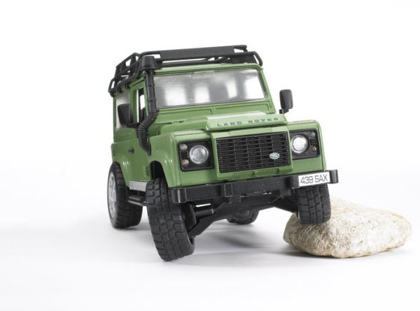 Land Rover Defender Station Wagon with JCB excavator