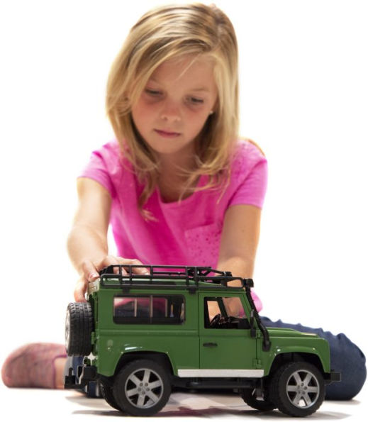 Land Rover Defender Station Wagon with JCB excavator