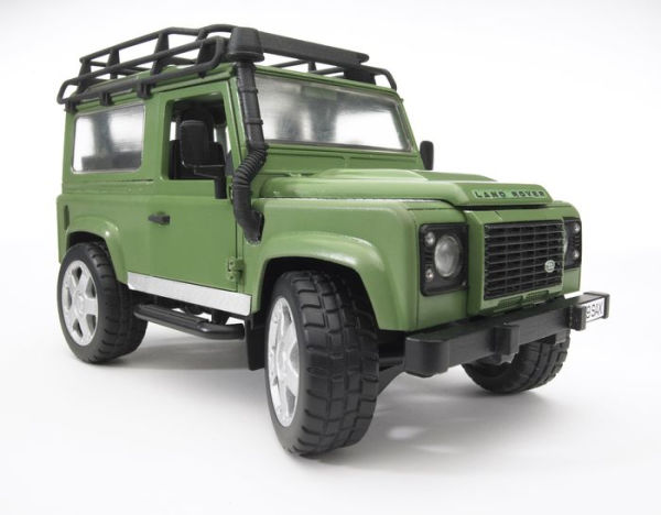 Land Rover Defender Station Wagon with JCB excavator