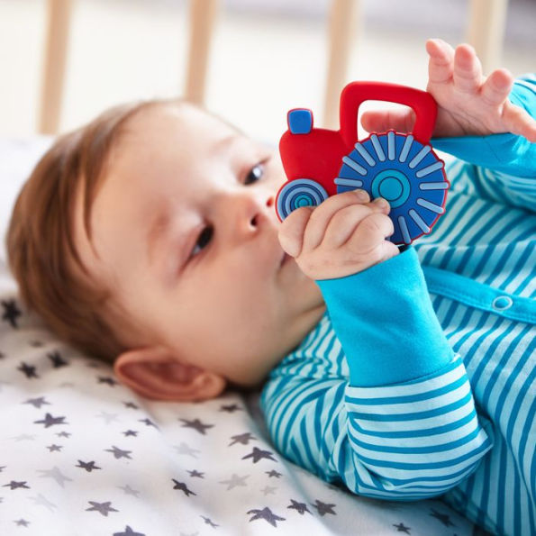 Clutching Toy Tractor