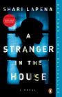 A Stranger in the House: A Novel