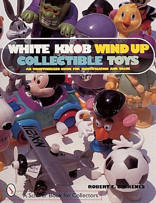 White Knob Wind Up Collectible Toys